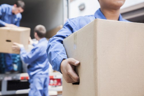 Small removals van handling furniture in Thehale