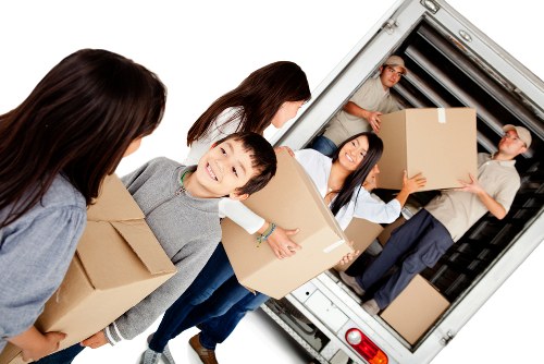 Professional removals team preparing home relocation in Thehale